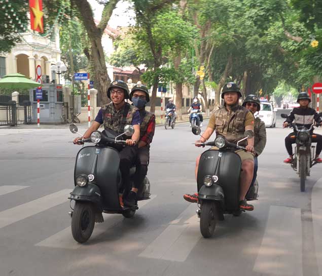 Slide tour Hanoi Vespa Tour